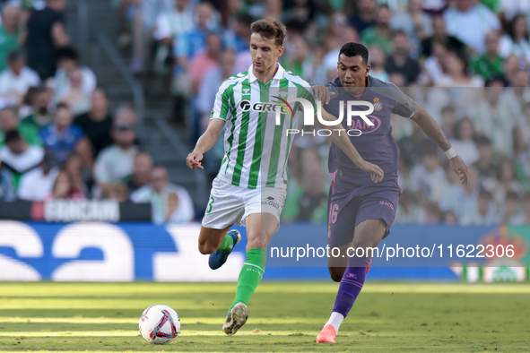 Diego Llorente of Real Betis passes the ball during the La Liga EA Sports match between Real Betis and RCD Espanyol at Benito Villamarin in...