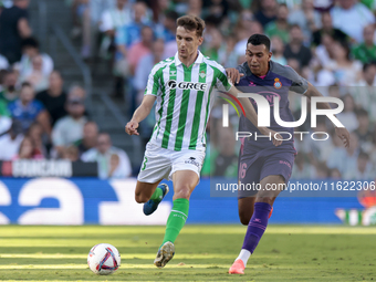 Diego Llorente of Real Betis passes the ball during the La Liga EA Sports match between Real Betis and RCD Espanyol at Benito Villamarin in...