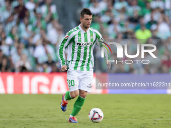 Giovani Lo Celso of Real Betis runs with the ball during the La Liga EA Sports match between Real Betis and RCD Espanyol at Benito Villamari...