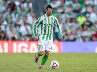 Giovani Lo Celso of Real Betis runs with the ball during the La Liga EA Sports match between Real Betis and RCD Espanyol at Benito Villamari...