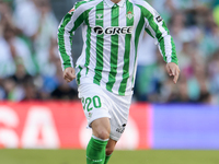 Giovani Lo Celso of Real Betis runs with the ball during the La Liga EA Sports match between Real Betis and RCD Espanyol at Benito Villamari...