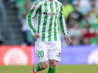 Giovani Lo Celso of Real Betis runs with the ball during the La Liga EA Sports match between Real Betis and RCD Espanyol at Benito Villamari...