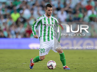 Giovani Lo Celso of Real Betis runs with the ball during the La Liga EA Sports match between Real Betis and RCD Espanyol at Benito Villamari...