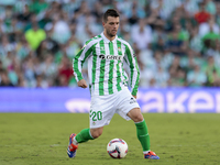 Giovani Lo Celso of Real Betis runs with the ball during the La Liga EA Sports match between Real Betis and RCD Espanyol at Benito Villamari...