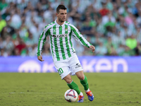 Giovani Lo Celso of Real Betis runs with the ball during the La Liga EA Sports match between Real Betis and RCD Espanyol at Benito Villamari...