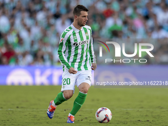 Giovani Lo Celso of Real Betis runs with the ball during the La Liga EA Sports match between Real Betis and RCD Espanyol at Benito Villamari...