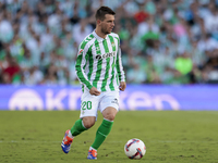 Giovani Lo Celso of Real Betis runs with the ball during the La Liga EA Sports match between Real Betis and RCD Espanyol at Benito Villamari...