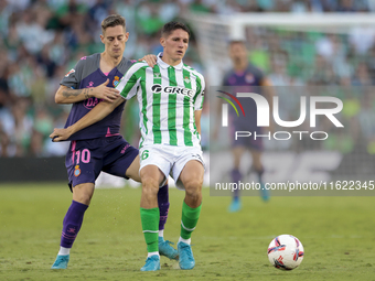 Sergi Altimira of Real Betis battles for the ball during the La Liga EA Sports match between Real Betis and RCD Espanyol at Benito Villamari...