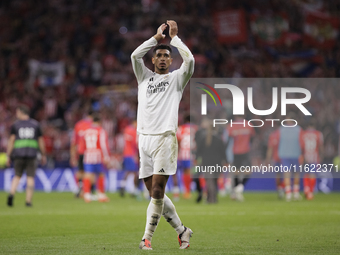 Jude Bellingham of Real Madrid greets fans during the La Liga 2024/25 match between Atletico de Madrid and Real Madrid at Civitas Metropolit...