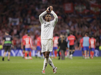 Jude Bellingham of Real Madrid greets fans during the La Liga 2024/25 match between Atletico de Madrid and Real Madrid at Civitas Metropolit...