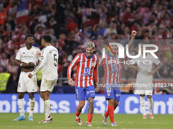 Angel Correa of Atletico de Madrid and Rodrigo De Paul of Atletico de Madrid celebrate a goal during the La Liga 2024/25 match between Atlet...