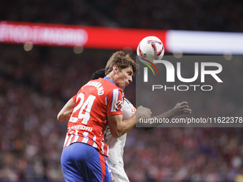 Robin Le Normand of Atletico de Madrid is in action during the La Liga 2024/25 match between Atletico de Madrid and Real Madrid at Civitas M...