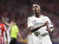 Vinicius Jr of Real Madrid reacts to a missed opportunity during the La Liga 2024/25 match between Atletico de Madrid and Real Madrid at Civ...