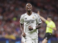 Vinicius Jr of Real Madrid reacts to a missed opportunity during the La Liga 2024/25 match between Atletico de Madrid and Real Madrid at Civ...