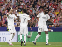 Eder Militao of Real Madrid and Vinicius Jr. of Real Madrid celebrate a goal during the La Liga 2024/25 match between Atletico de Madrid and...