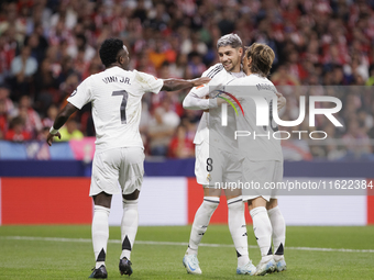 Several players of Real Madrid celebrate a goal during the La Liga 2024/25 match between Atletico de Madrid and Real Madrid at Civitas Metro...