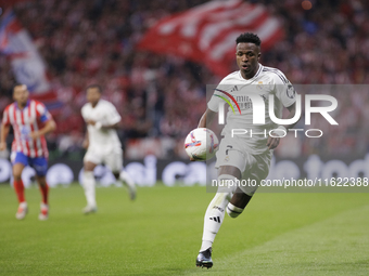 Vinicius Jr of Real Madrid is in action during the La Liga 2024/25 match between Atletico de Madrid and Real Madrid at Civitas Metropolitano...