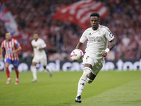 Vinicius Jr of Real Madrid is in action during the La Liga 2024/25 match between Atletico de Madrid and Real Madrid at Civitas Metropolitano...