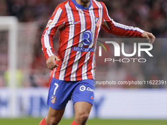 Antoine Griezmann of Atletico de Madrid is in action during the La Liga 2024/25 match between Atletico de Madrid and Real Madrid at Civitas...