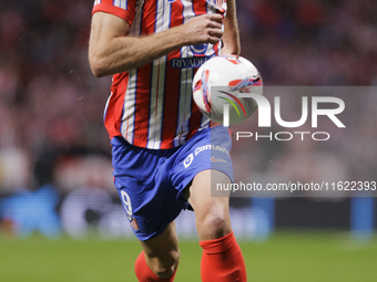 Alexander Sorloth of Atletico de Madrid is in action during the La Liga 2024/25 match between Atletico de Madrid and Real Madrid at Civitas...