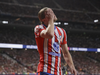 Conor Gallagher of Atletico de Madrid reacts to a missed opportunity during the La Liga 2024/25 match between Atletico de Madrid and Real Ma...