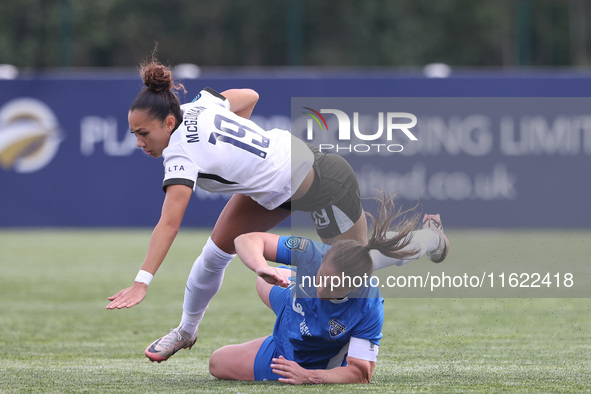 Sarah Wilson of Durham Women upends Tegan McGowan in a tackle during the FA Women's Championship match between Durham Women FC and Birmingha...