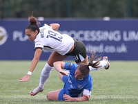 Sarah Wilson of Durham Women upends Tegan McGowan in a tackle during the FA Women's Championship match between Durham Women FC and Birmingha...