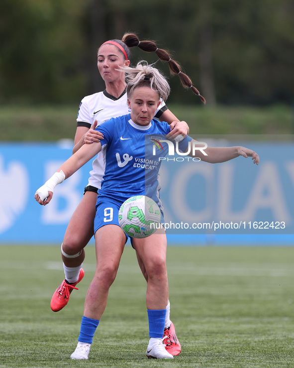 Durham Women's Carly Johns battles with Birmingham City's Libby Smith during the FA Women's Championship match between Durham Women FC and B...