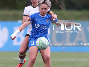 Durham Women's Carly Johns battles with Birmingham City's Libby Smith during the FA Women's Championship match between Durham Women FC and B...