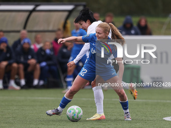 Lily Crosthwaite of Durham Women battles for possession with Geum-Min Lee of Birmingham City Women during the FA Women's Championship match...