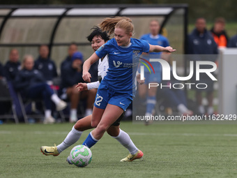 Lily Crosthwaite of Durham Women battles for possession with Geum-Min Lee of Birmingham City Women during the FA Women's Championship match...