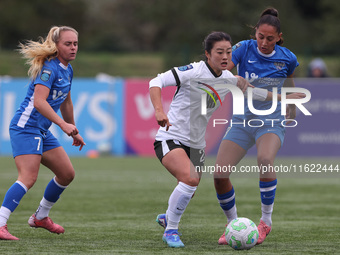 Mollie Lambert of Durham Women battles with Yu-ri Choe of Birmingham City Women during the FA Women's Championship match between Durham Wome...