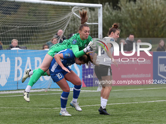 Lucy Thomas of Birmingham City Women lands on Hannah Blake of Durham Women while claiming a cross during the FA Women's Championship match b...