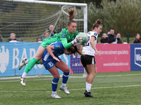 Lucy Thomas of Birmingham City Women lands on Hannah Blake of Durham Women while claiming a cross during the FA Women's Championship match b...