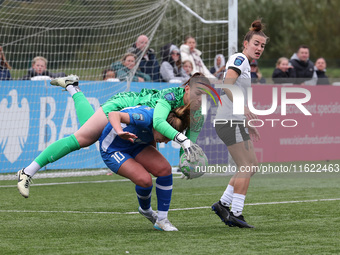 Lucy Thomas of Birmingham City Women lands on Hannah Blake of Durham Women while claiming a cross during the FA Women's Championship match b...