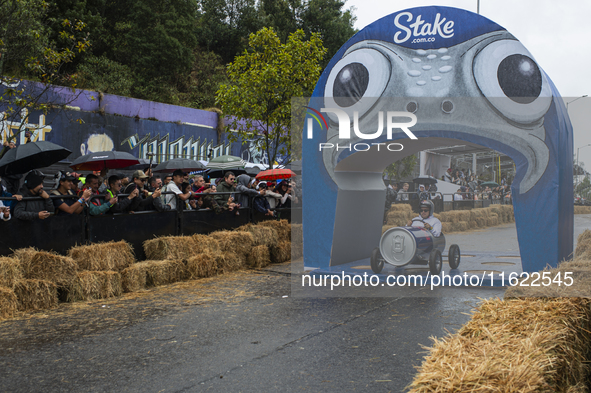 Soapbox cars and teams take part in the Red Bull Balineras race, a soapbox race that returns after 12 years, in Bogota, Colombia, on Septemb...