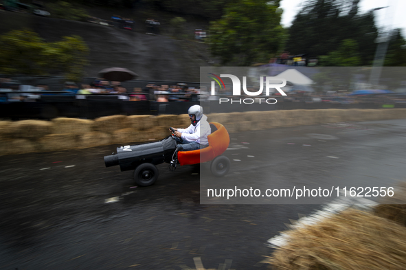 Soapbox cars and teams take part in the Red Bull Balineras race, a soapbox race that returns after 12 years, in Bogota, Colombia, on Septemb...