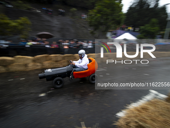 Soapbox cars and teams take part in the Red Bull Balineras race, a soapbox race that returns after 12 years, in Bogota, Colombia, on Septemb...