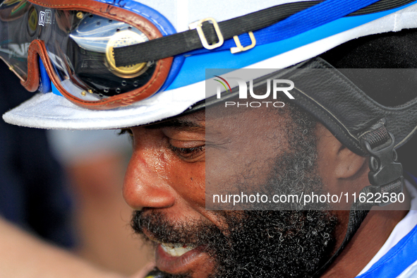 Jockey Juan Crawford returns from the track following a win on Dark Screen in the sixth race at Woodbine Racetrack in Toronto, Canada, on Se...