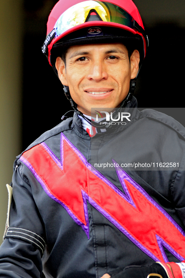 Jockey Jose Campos leaves the paddock ahead of the seventh race at Woodbine Racetrack in Toronto, Canada, on September 29, 2024. 