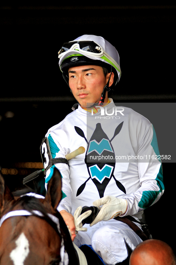 Jockey Kazushi Kimura leaves the paddock ahead of the seventh race at Woodbine Racetrack in Toronto, Canada, on September 29, 2024. 