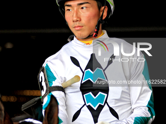 Jockey Kazushi Kimura leaves the paddock ahead of the seventh race at Woodbine Racetrack in Toronto, Canada, on September 29, 2024. (