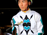 Jockey Kazushi Kimura leaves the paddock ahead of the seventh race at Woodbine Racetrack in Toronto, Canada, on September 29, 2024. (