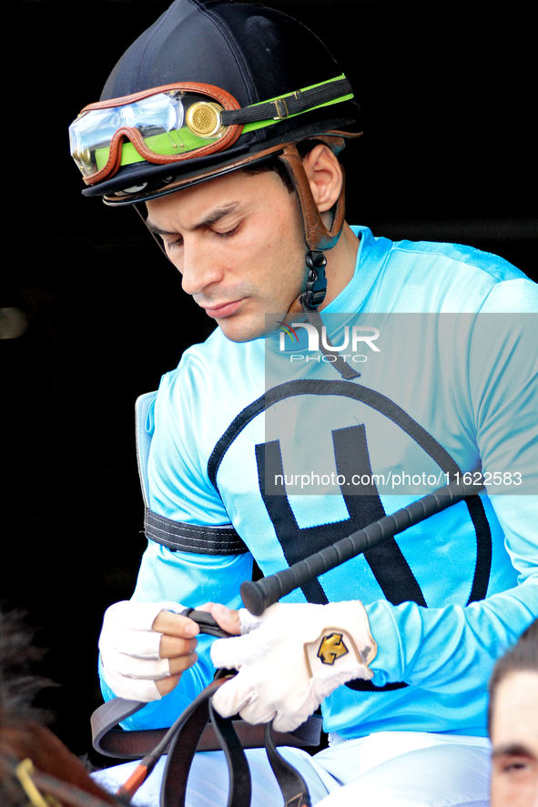 Jockey Sahin Civaci leaves the paddock on War Strategy ahead of a win in the seventh race at Woodbine Racetrack in Toronto, Canada, on Septe...