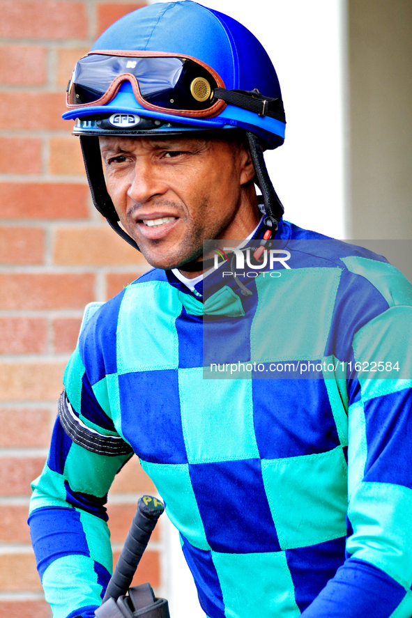 Jockey Patrick Husbands leaves the paddock ahead of the seventh race at Woodbine Racetrack in Toronto, Canada, on September 29, 2024. 