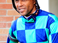 Jockey Patrick Husbands leaves the paddock ahead of the seventh race at Woodbine Racetrack in Toronto, Canada, on September 29, 2024. (