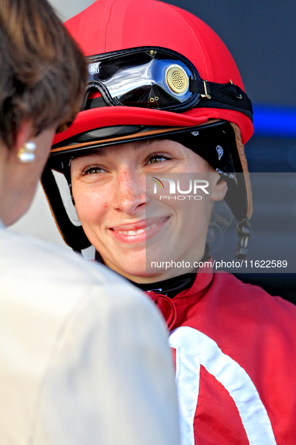 Jockey Sofia Vives smiles while talking to connections after the seventh race at Woodbine Racetrack in Toronto, Canada, on September 29, 202...