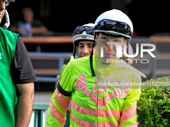 Jockey Emma-Jayne Wilson enters the walking ring ahead of the 134th running of the $400,000 Breeders' Stakes, the third race of the OLG Cana...