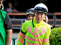 Jockey Emma-Jayne Wilson enters the walking ring ahead of the 134th running of the $400,000 Breeders' Stakes, the third race of the OLG Cana...