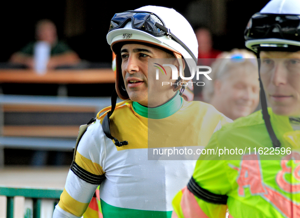 Jockey Rafael Hernandez enters the walking ring ahead of the 134th running of the $400,000 Breeders' Stakes, the third race of the OLG Canad...